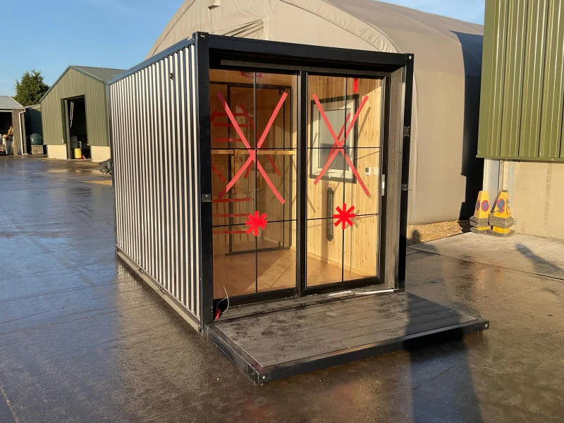 BPI Auctions - 20ft Prefab Tiny Cube with Washroom, 2024 Container Sauna Room, & 40ft - 8ft High Cube & Office Containers at Auction - Auction Image 1