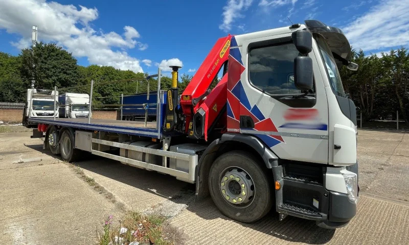 Salvue Ltd. - 2024 Volvo FE320 6x2 Flat Bed Truck with Palfinger SLD5 - Chemical Spill Damage (IBC Failure) at Auction - Auction Image 1