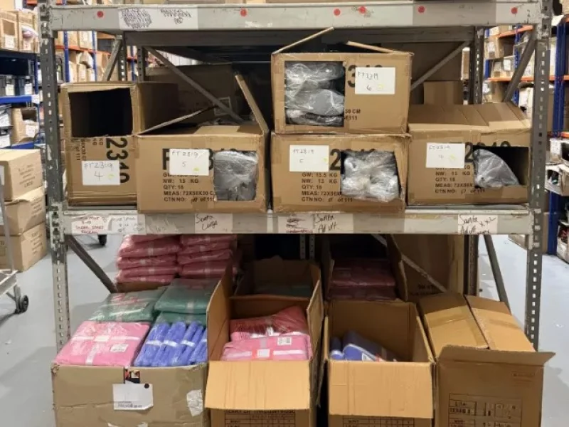 JPS Chartered Surveyors - *SHORT NOTICE AUCTION* | Stock & Associated Fixtures and Fittings of Online Clothing Retailer | Includes: Clothing Stock, Racking, Furniture & More - Auction Image 1