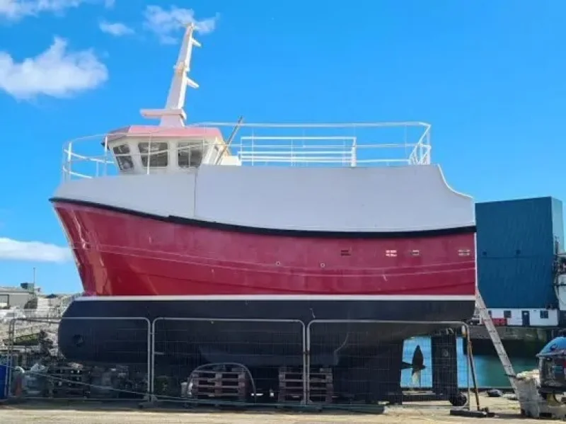 Red and white large boat